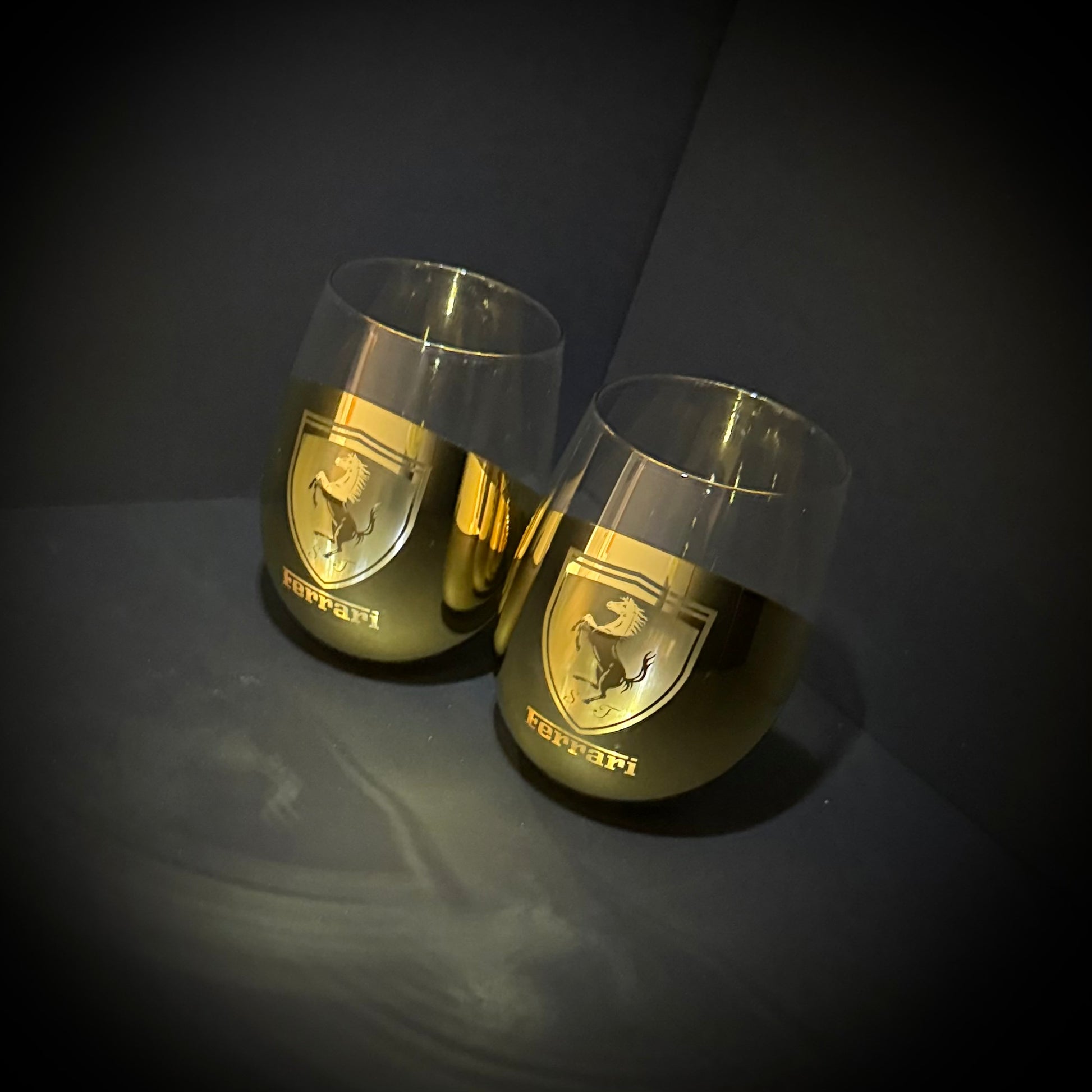 Two Ferrari-branded wine glasses