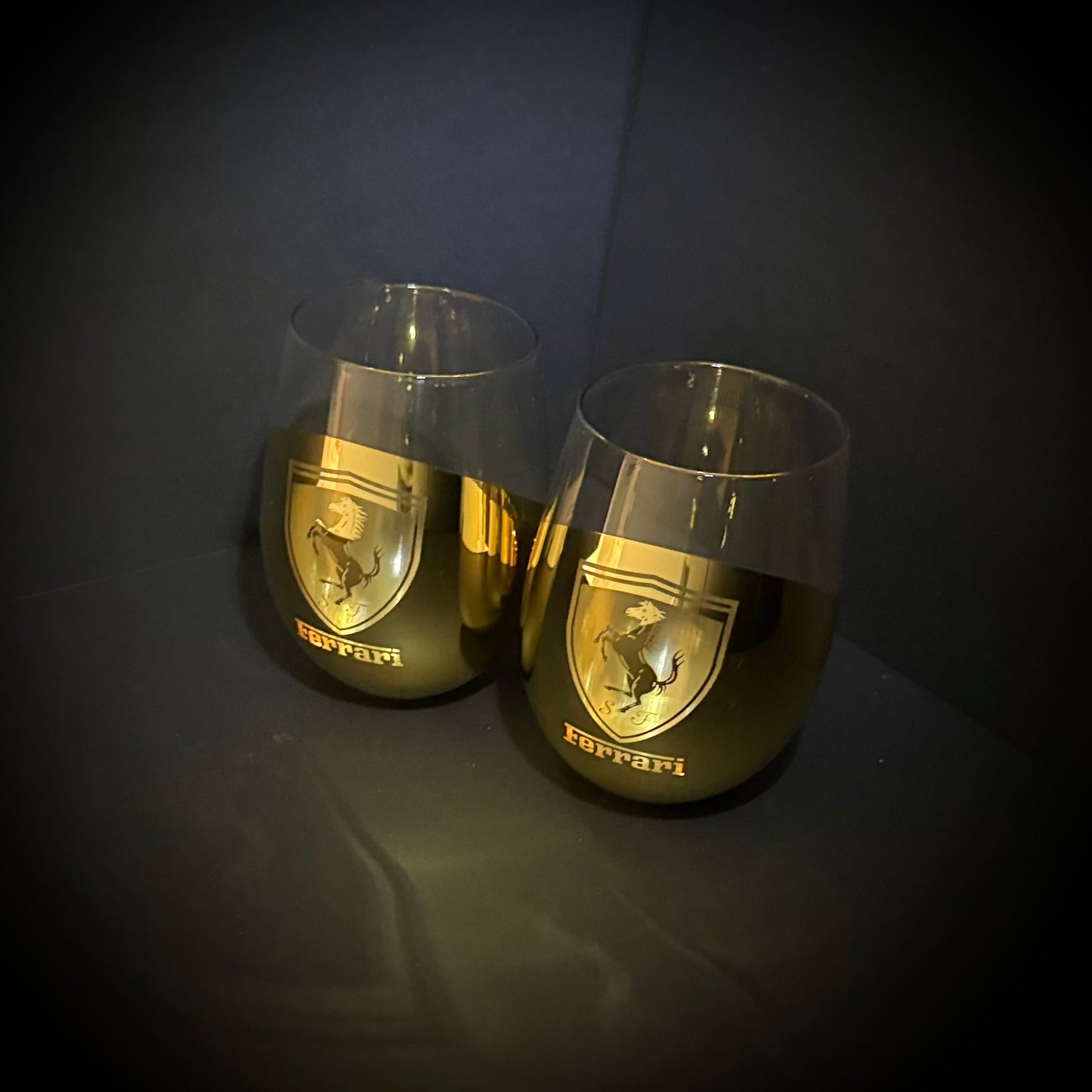 Two Ferrari-branded wine glasses