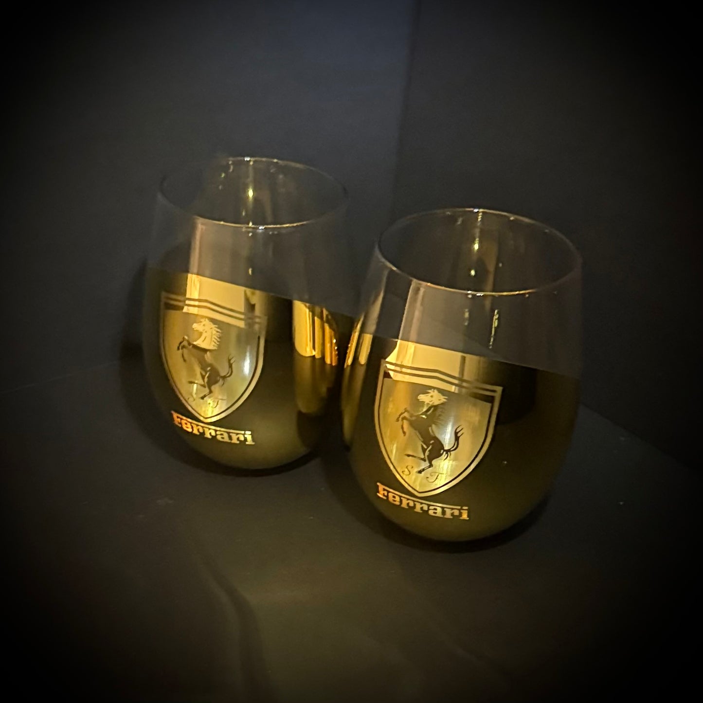 Two Ferrari-branded wine glasses