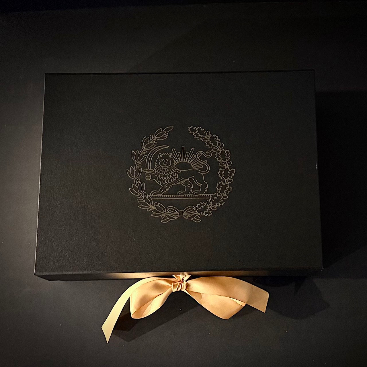 Premium black gift box with Royal Persian Lion and Sun and gold ribbon for luxury wine glass set