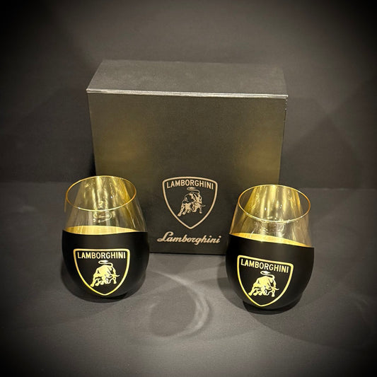 Matte black bull-inspired glasses with reflective gold interior presented with luxury black gift box