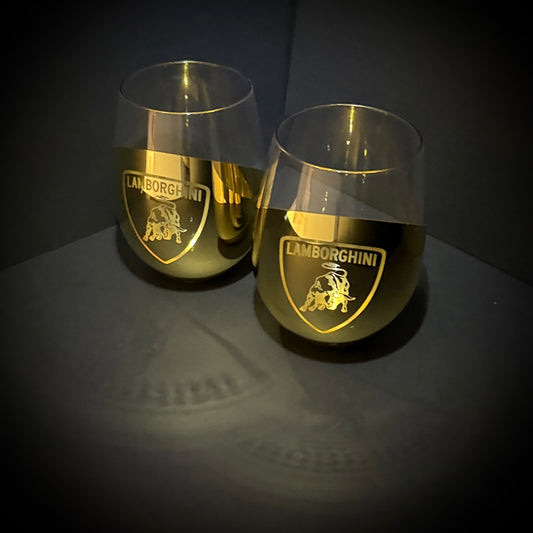 Two Golden Lamborghini-branded wine glasses